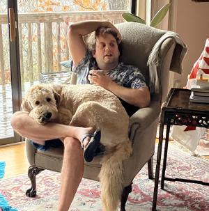 Picture of Charles Perkins and his dog, Tuesday